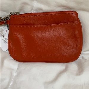 NWT Classy COACH Orange Leather Wristlet